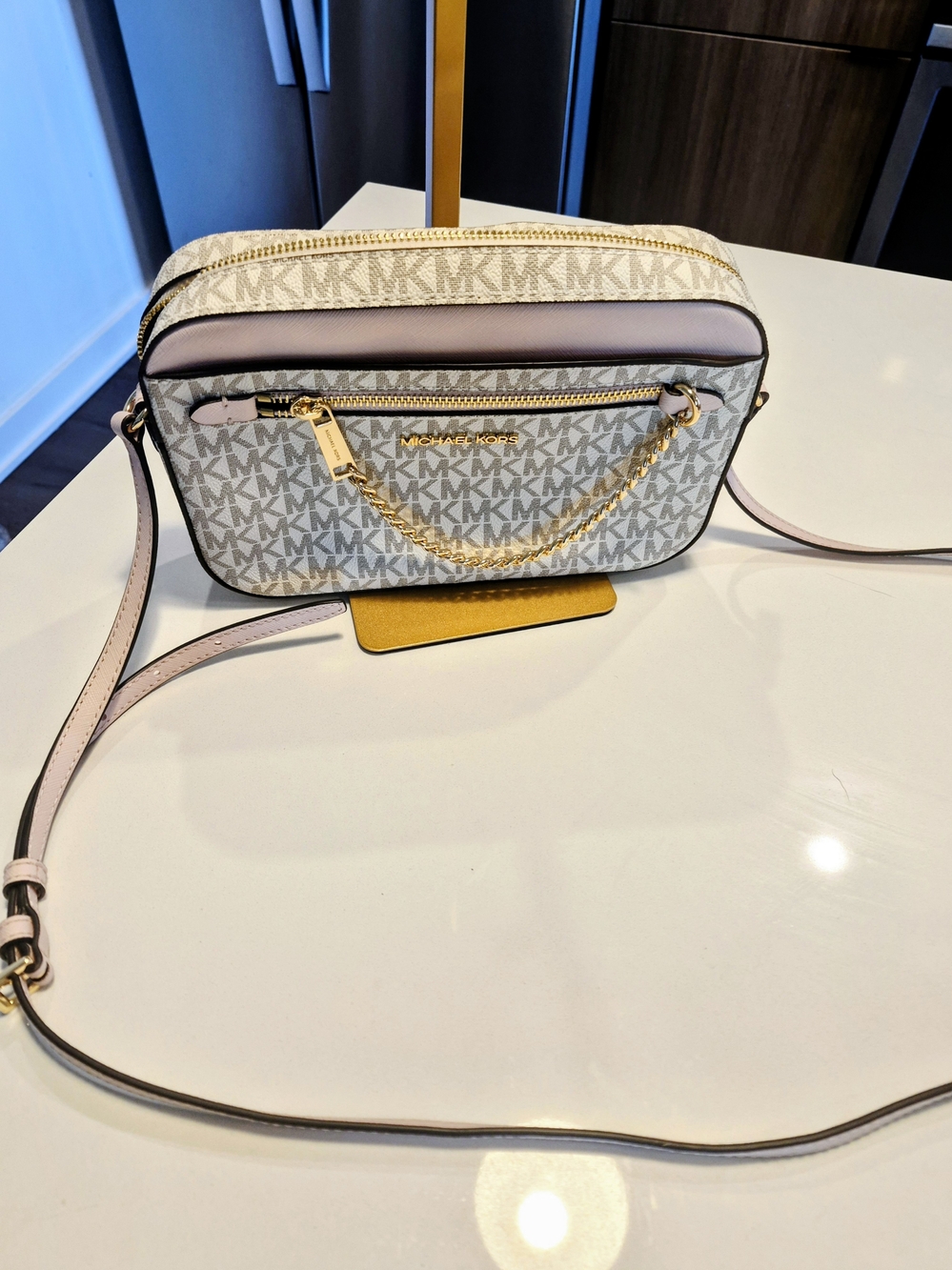 Michael Kors Jet Set Large Logo Chain Crossbody Bag in the Vanilla and Powder Bl